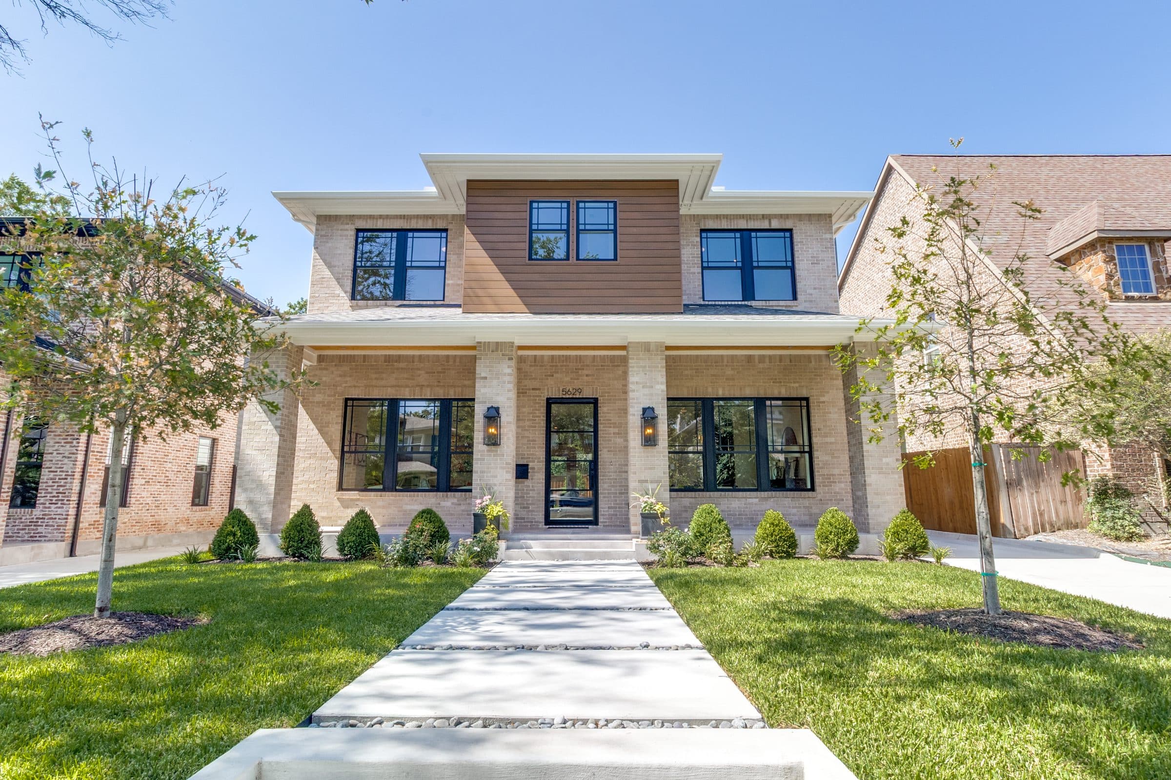 Modern farmhouse-style home front entry and porch