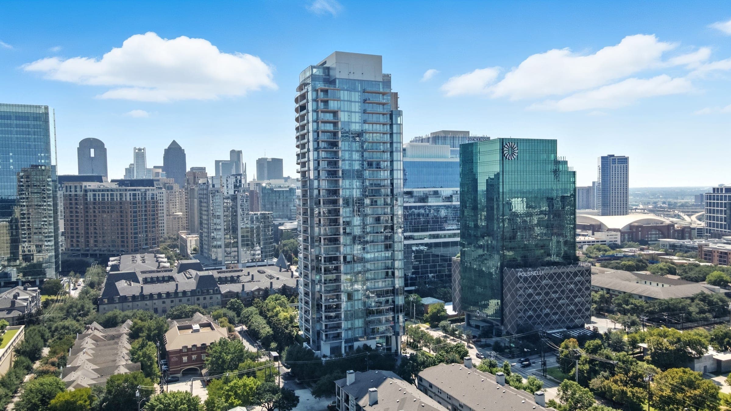 Aerial drone photograph of high-rise towers in Uptown Dallas