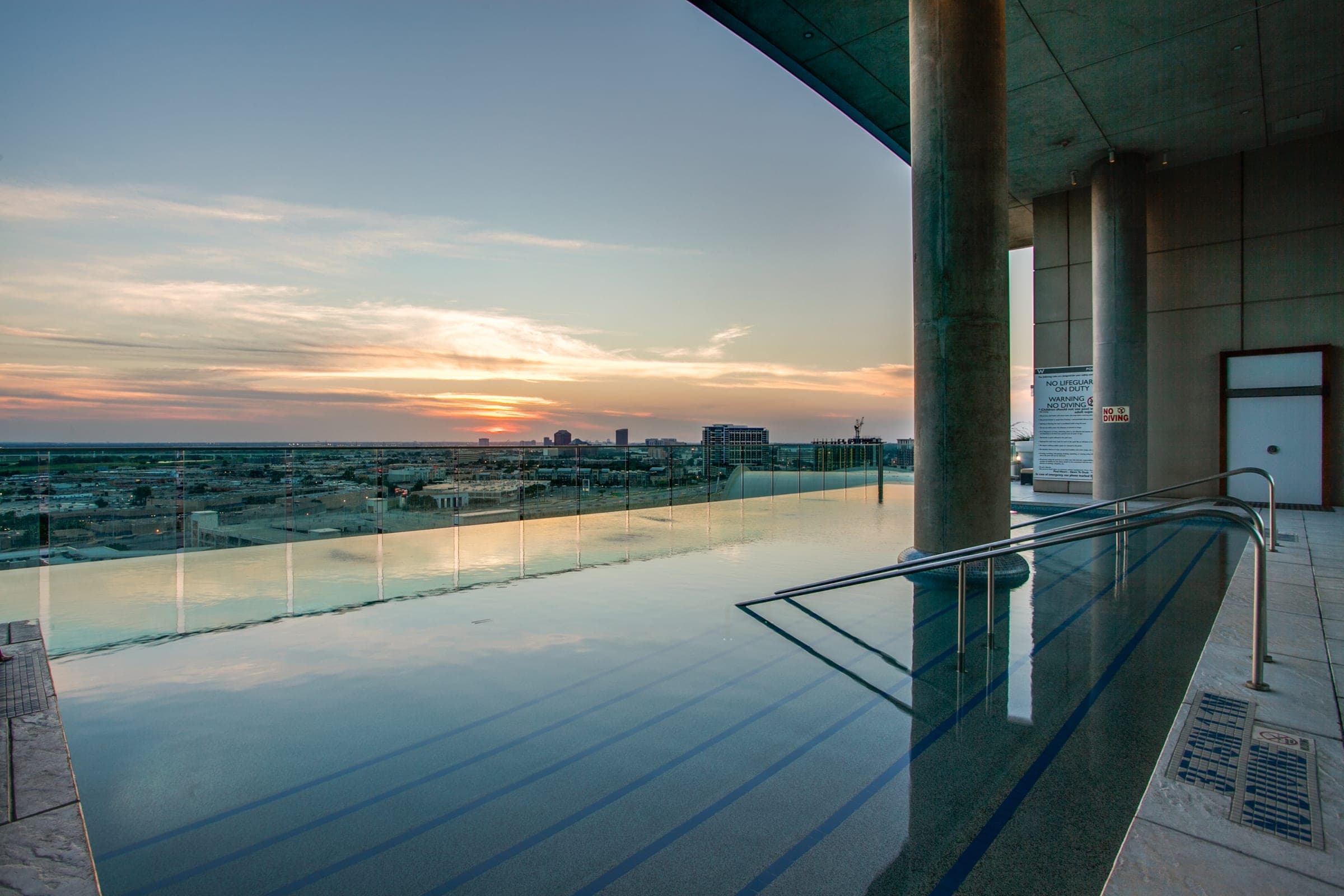 Residential tower rooftop amenity terrace with city view